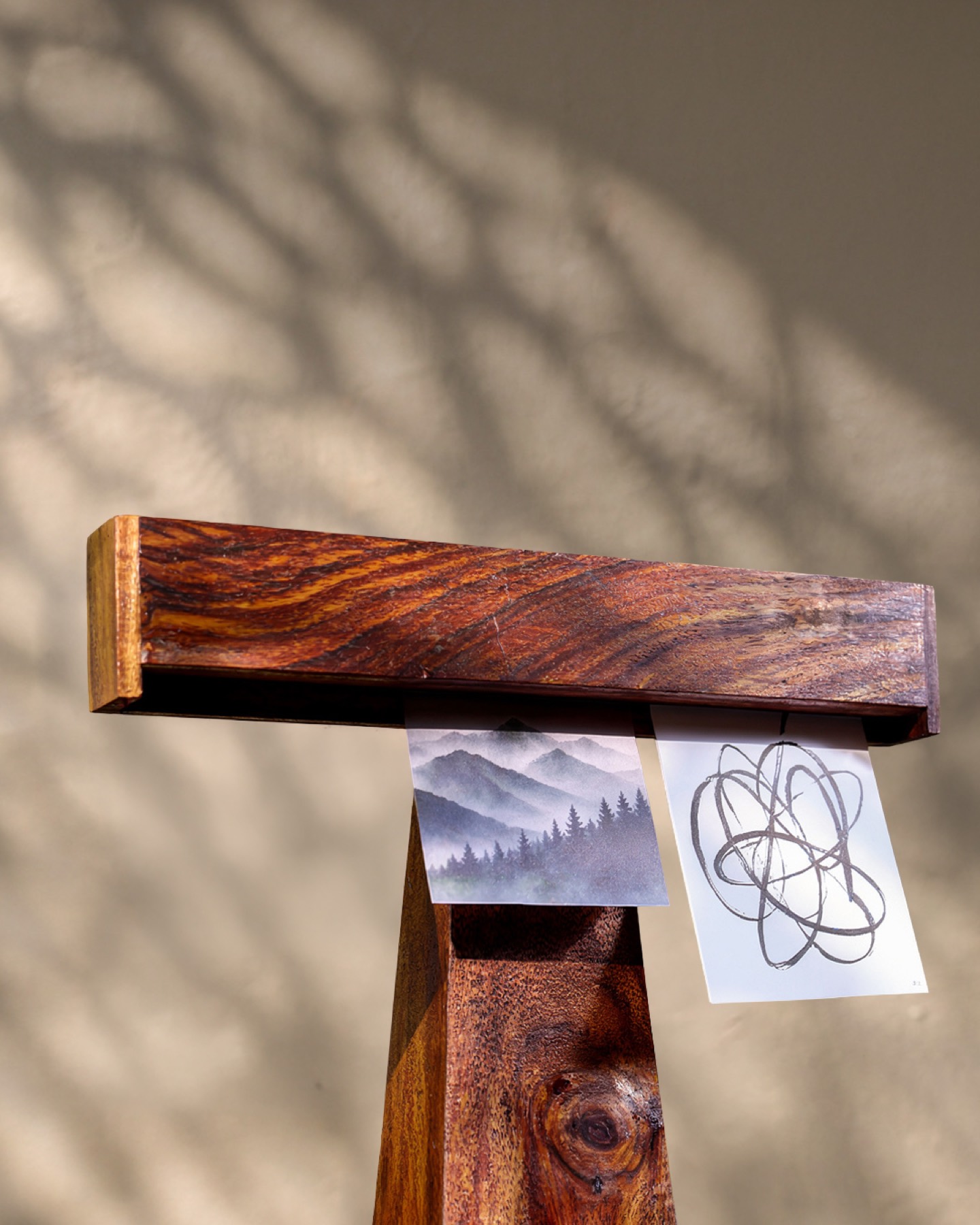 Detail of the crossbar holding two art cards